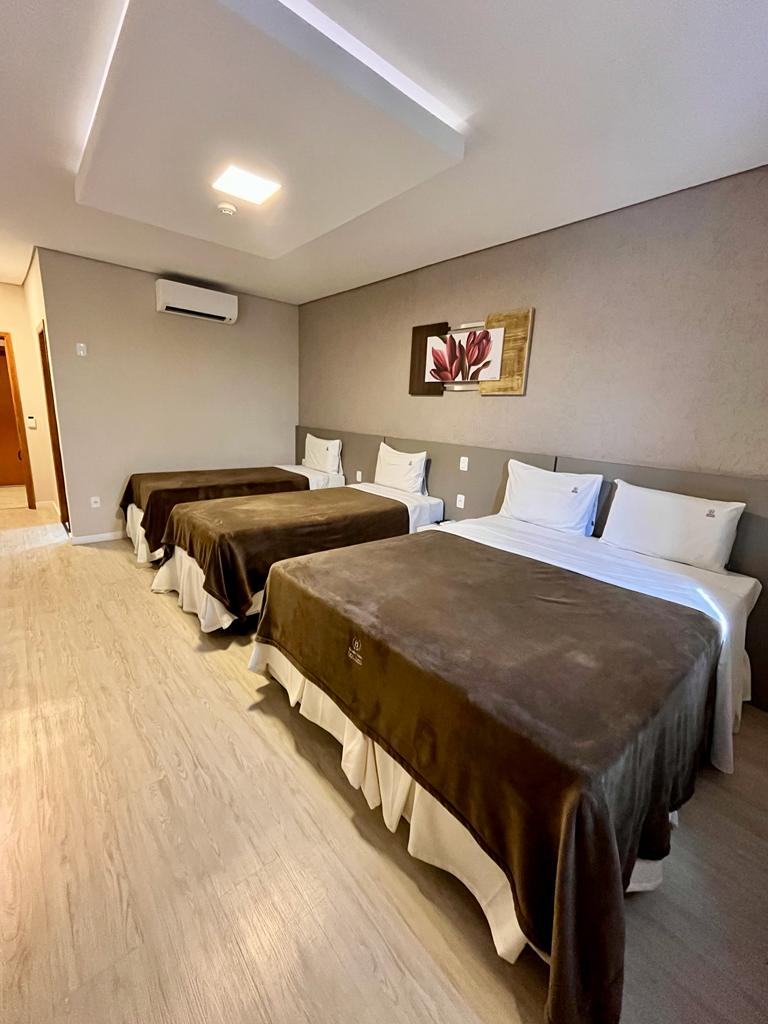 Quarto quádruplo do Business Park Hotel