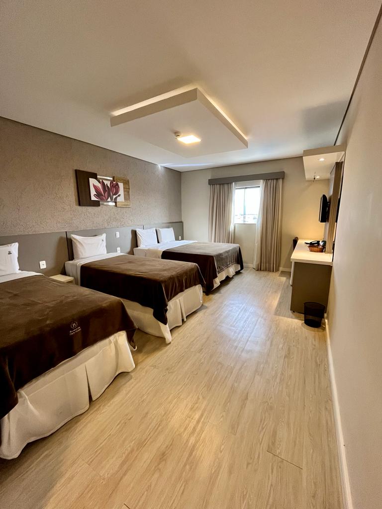 Quarto para três pessoas do Business Park Hotel